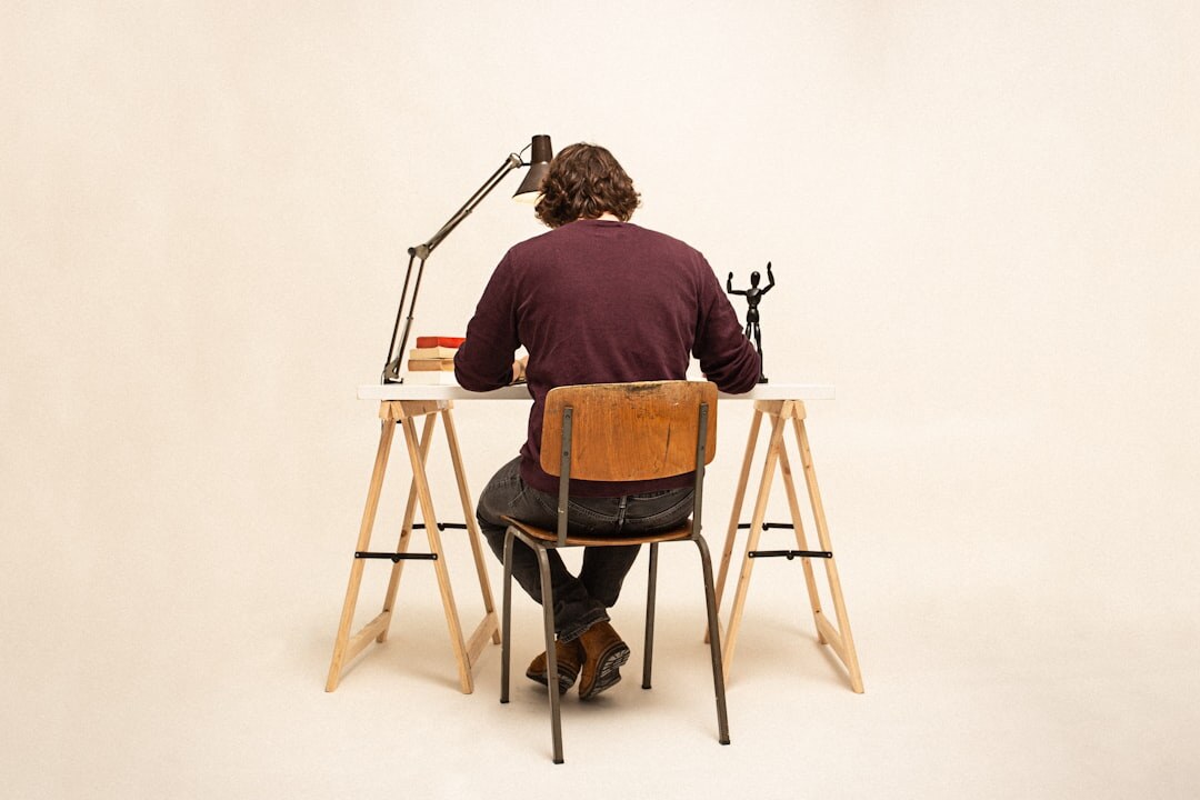 author writing at desk