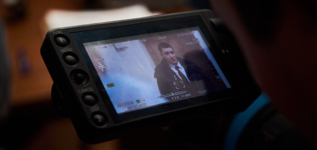 Close-up of a video monitor showing an interview recording being reviewed
