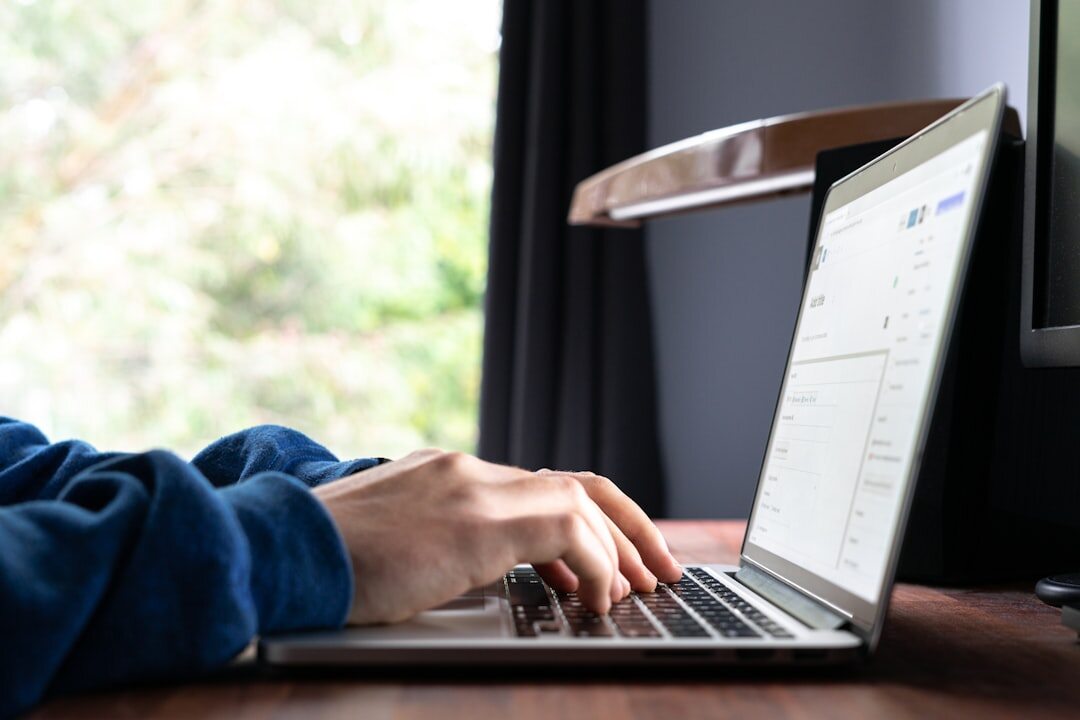 person reading blog on laptop